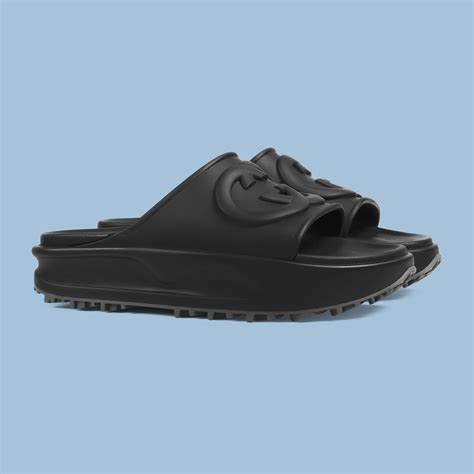 Men's Interlocking G slide sandal in black rubber 